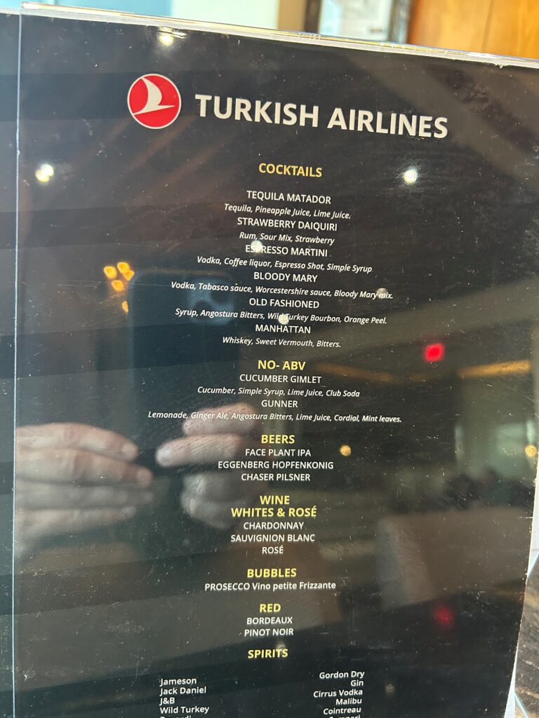 a menu on a glass wall