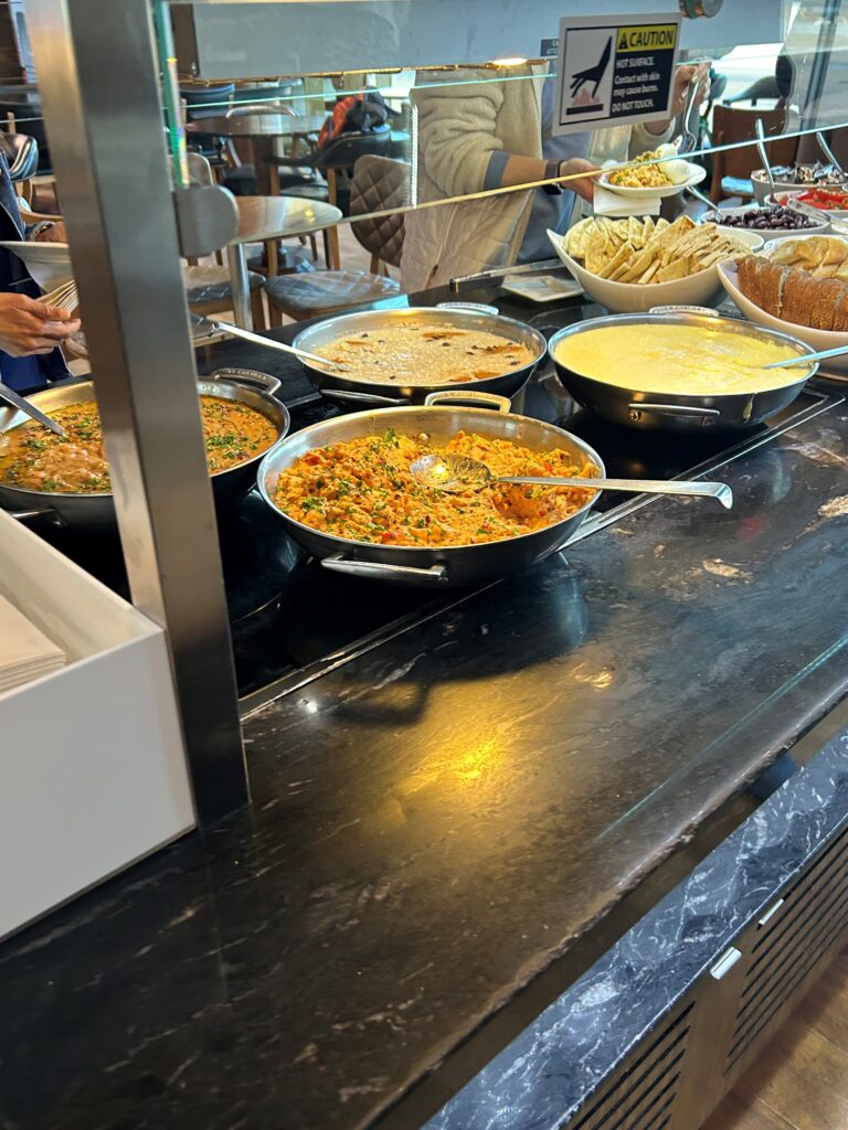 a buffet line of food
