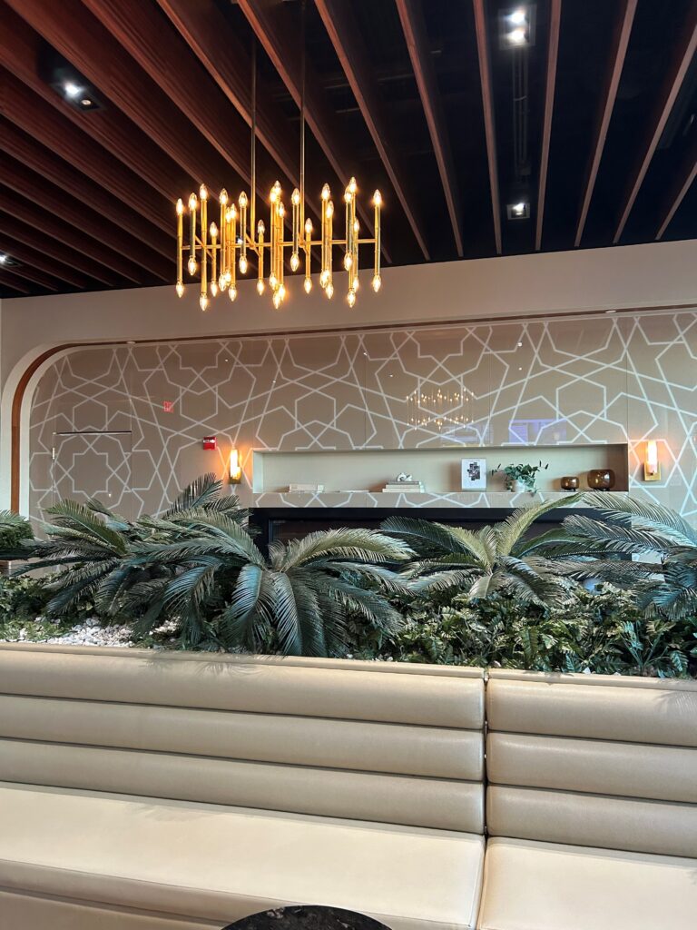 a chandelier over a couch