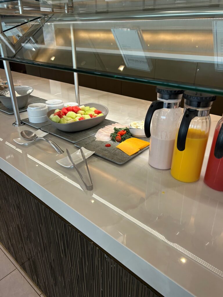 a buffet counter with food on it