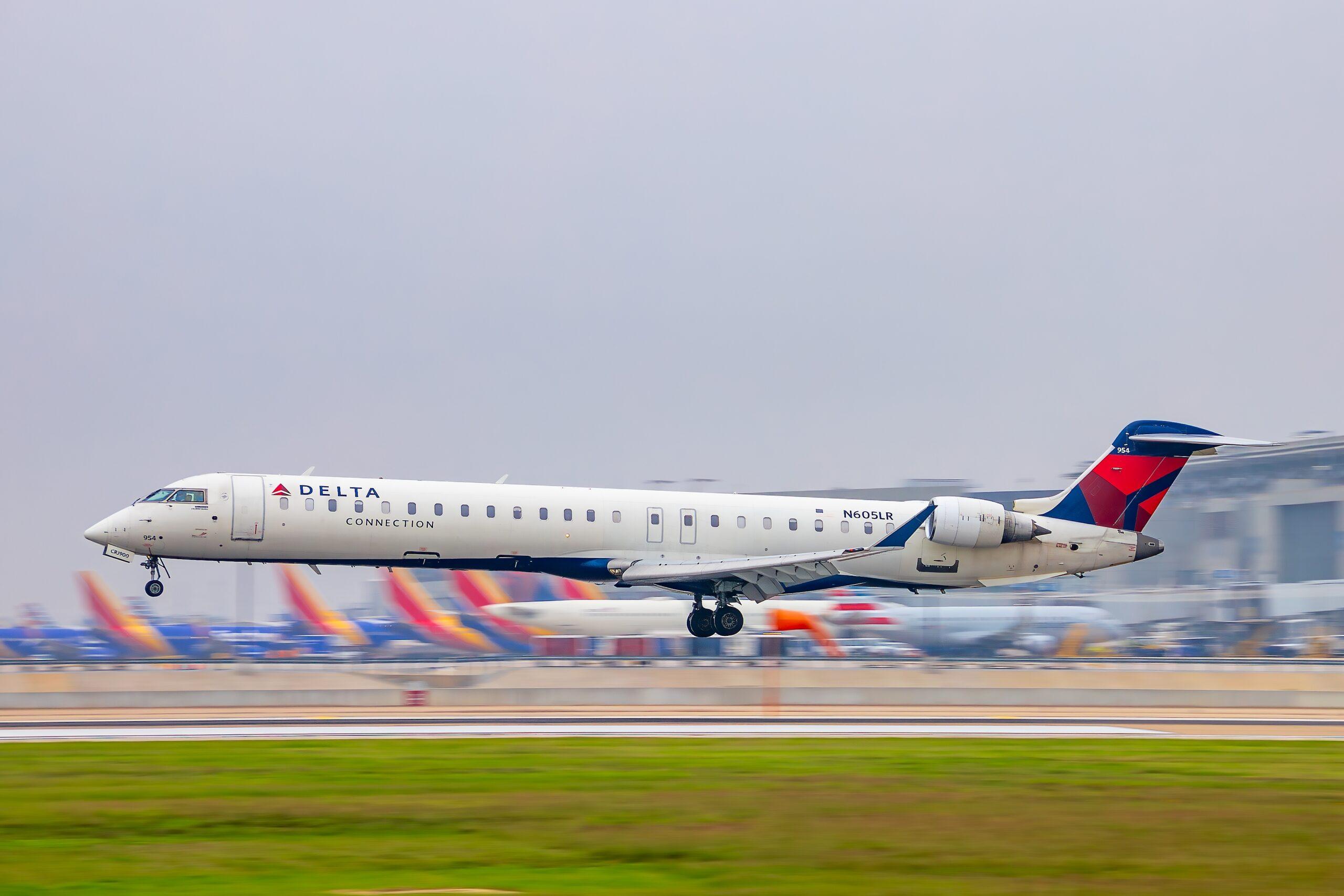 Passengers On Delta Air Flight to New York LaGuardia Experience Hairy Landing As Wing Strikes Runway On Tocuhdown Sending Sparks Flying