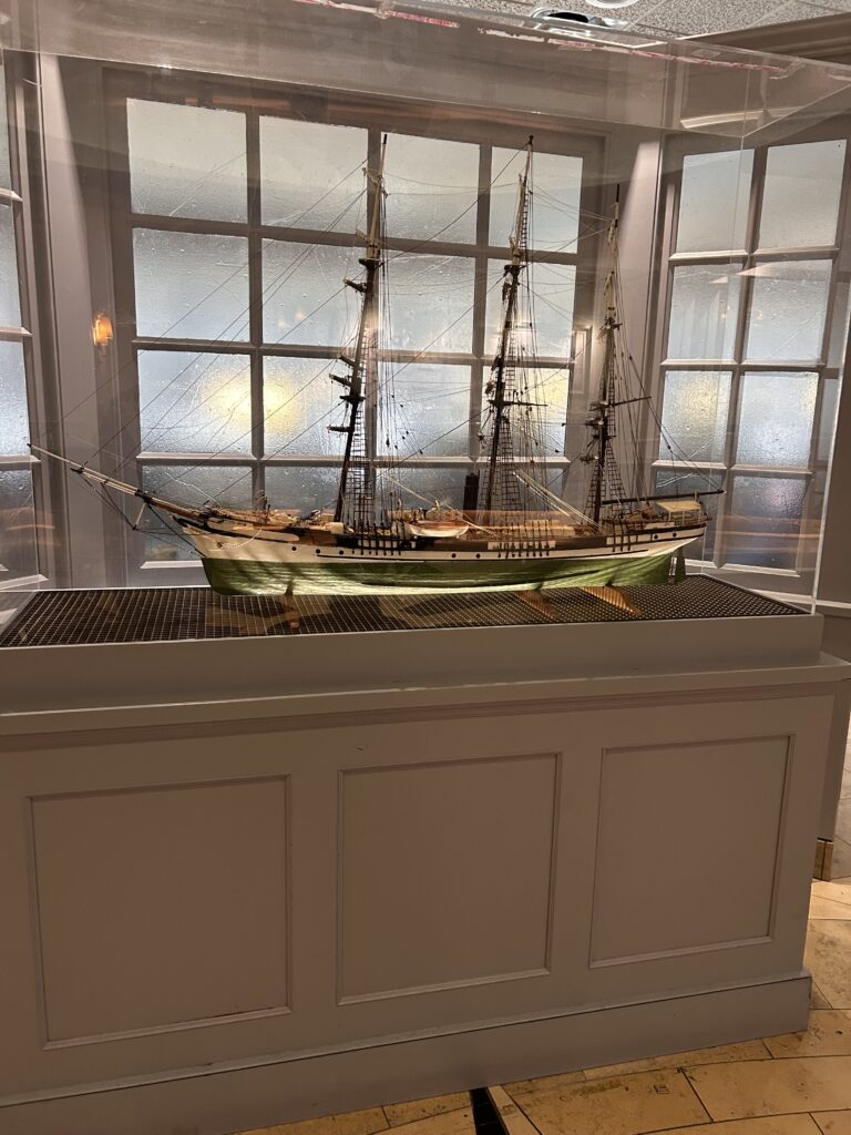 a model of a ship in a glass case