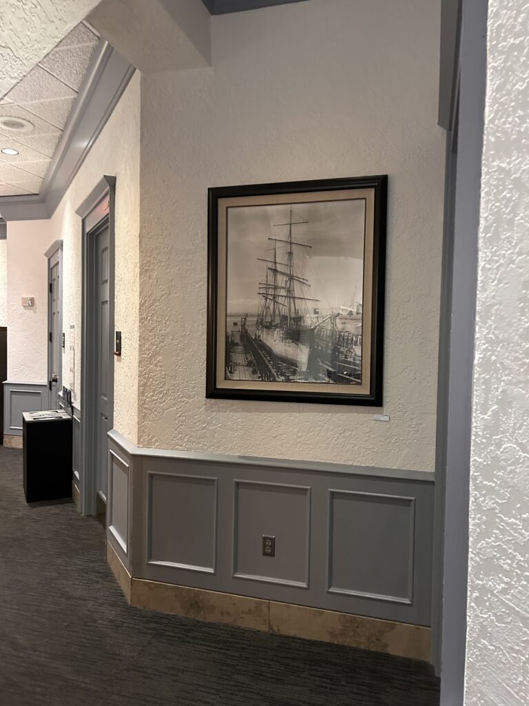 a framed picture on a wall
