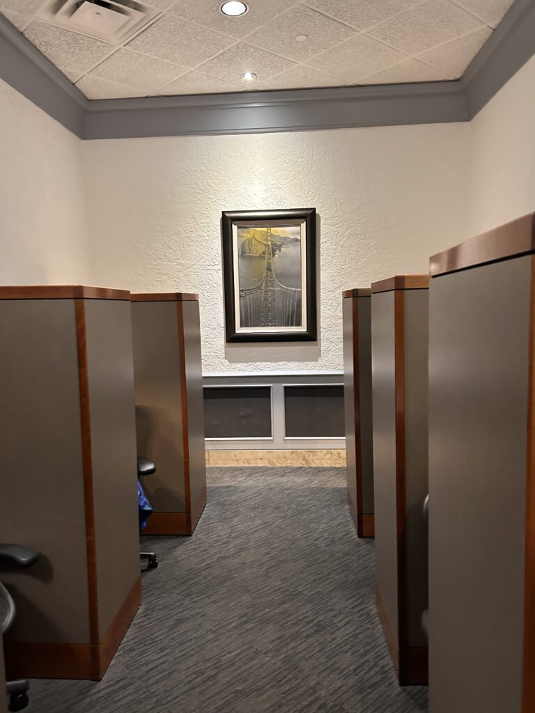 a room with a painting on the wall