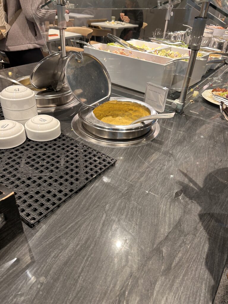 food on a counter with a tray of food