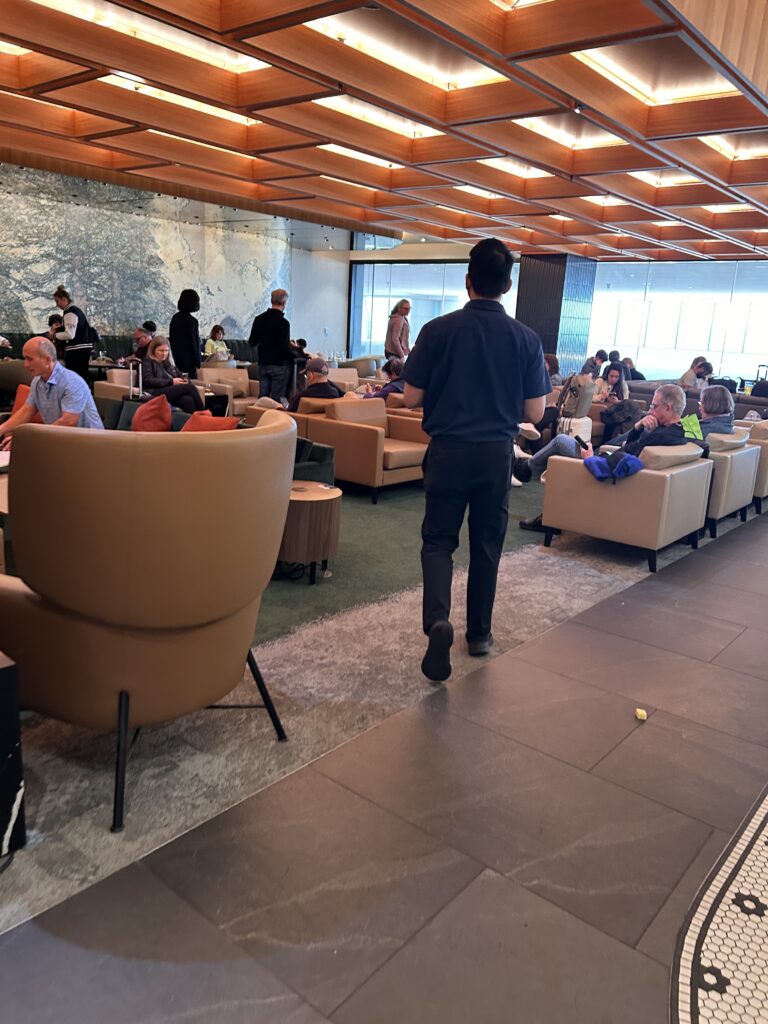 a group of people sitting in chairs in a room