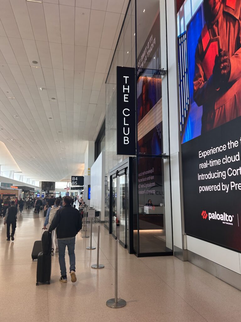 people walking in a large airport