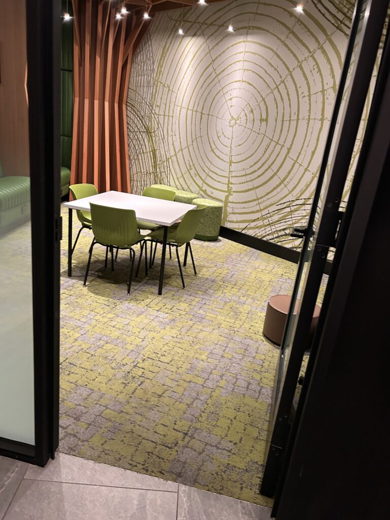a room with a table and chairs