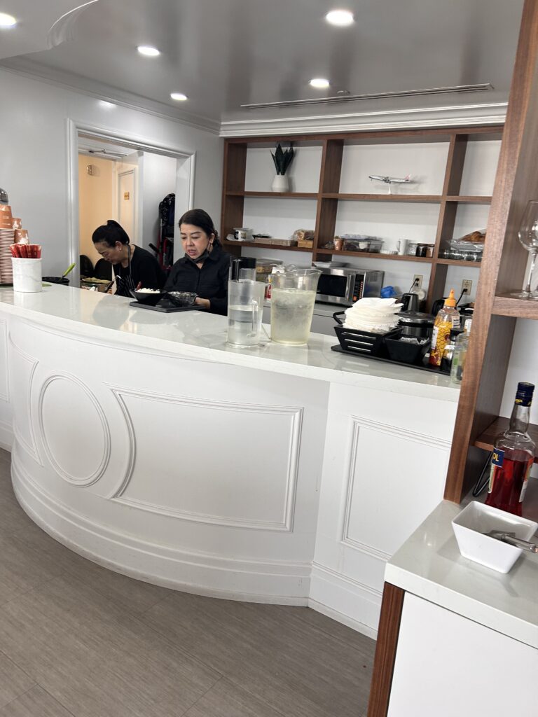 a woman behind a counter