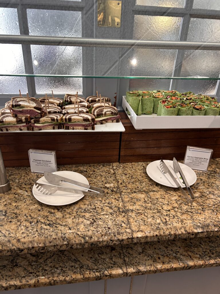 a counter with plates and utensils on it