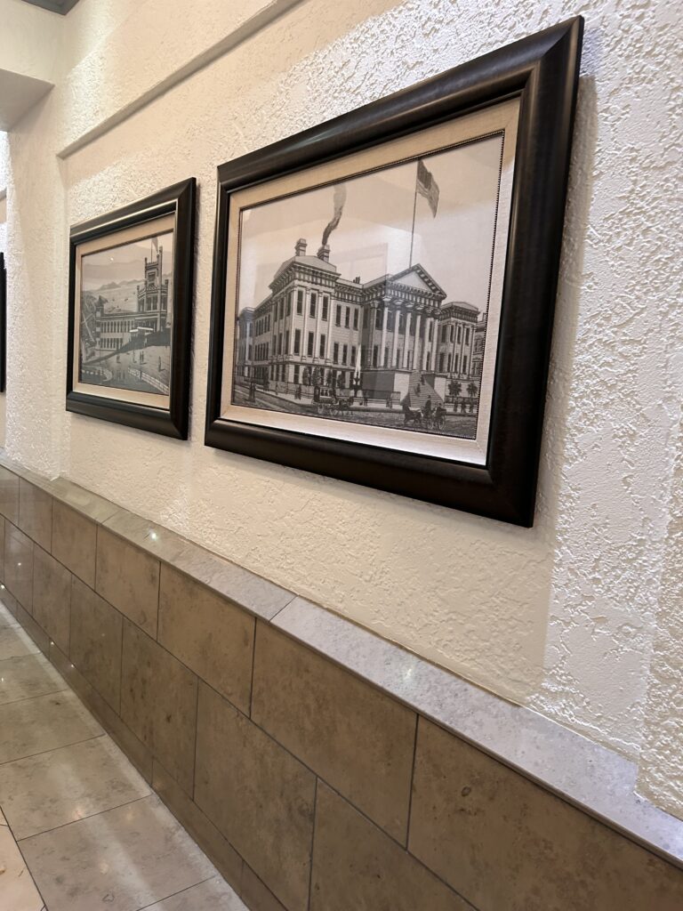 a picture of a building on a wall