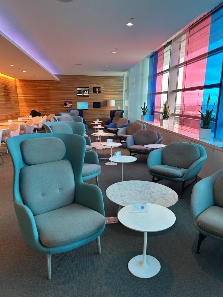 a room with chairs and tables