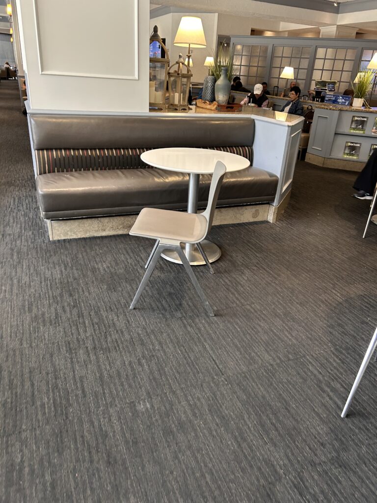 a table and chair in a room