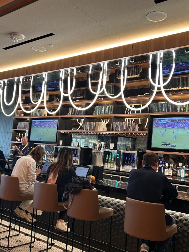 people sitting at a bar