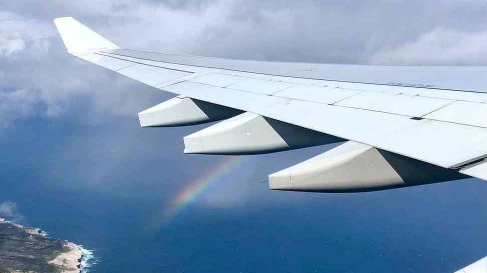 an airplane wing in the sky