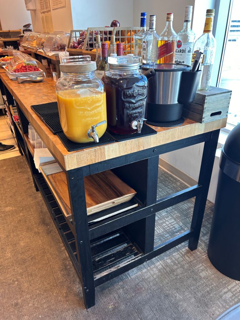 a table with jars of liquid and bottles of liquid on it