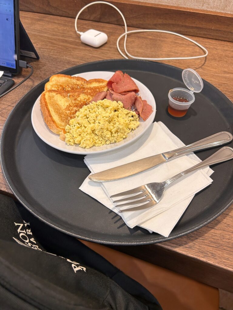 a plate of food on a tray