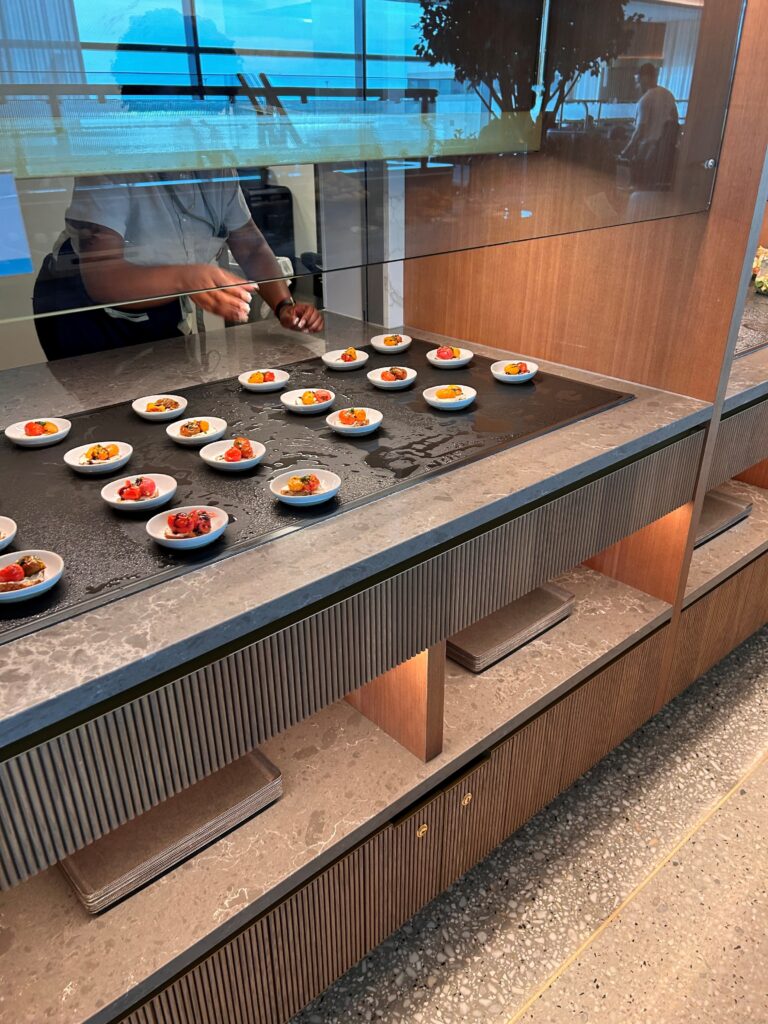 a person cooking food on plates