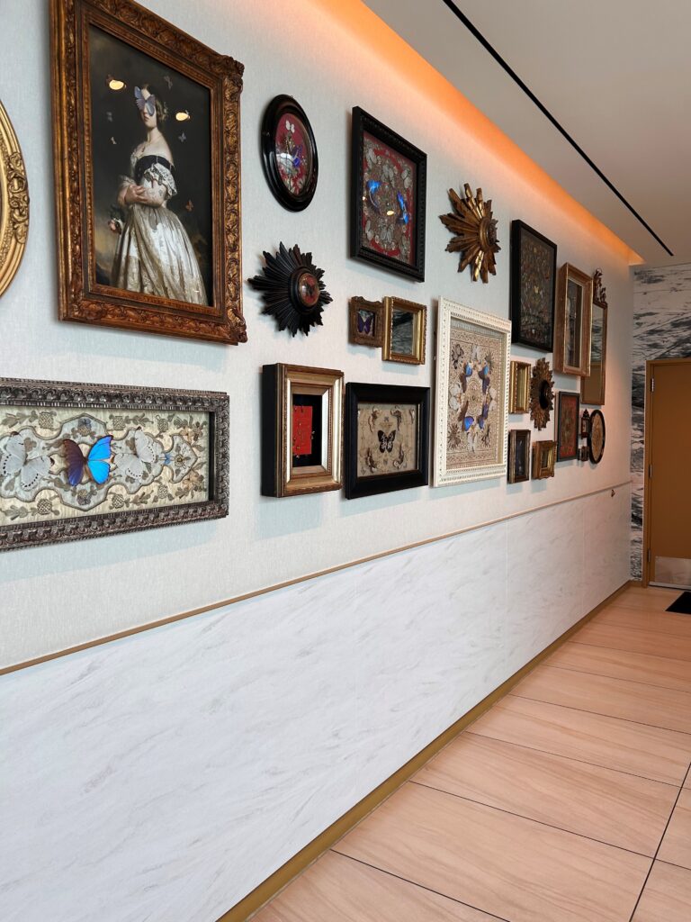 a wall with pictures on it
