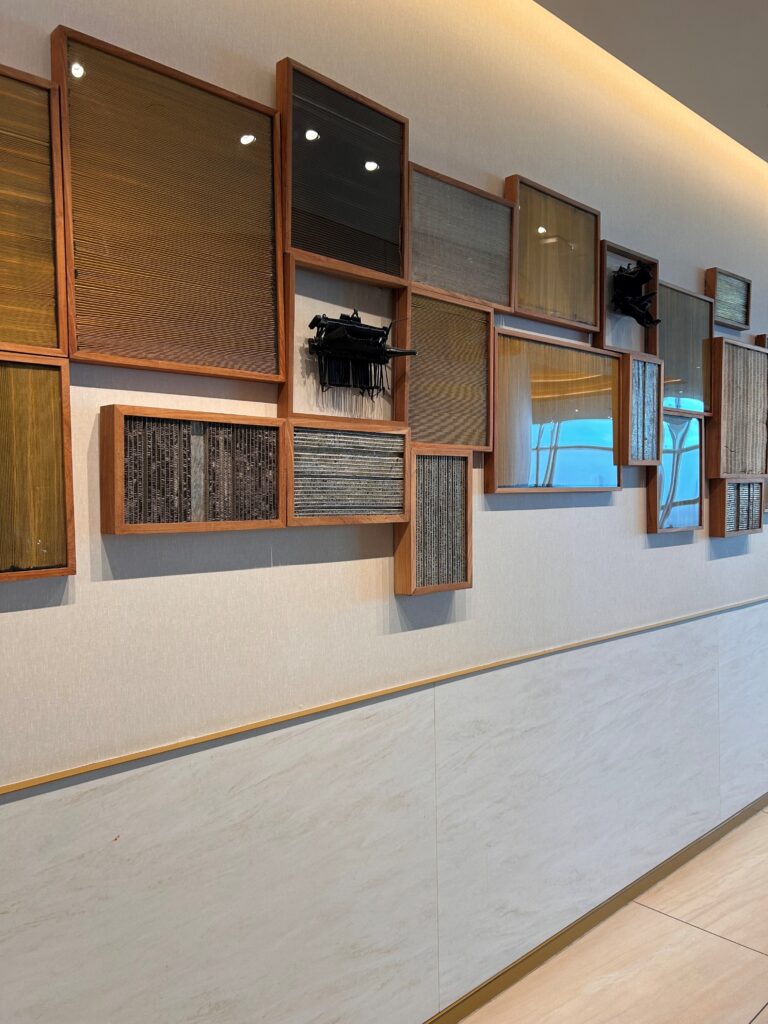 a wall with many frames on it