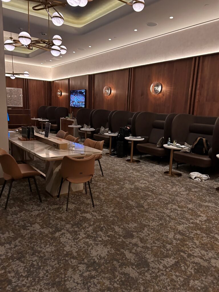 a room with chairs and tables