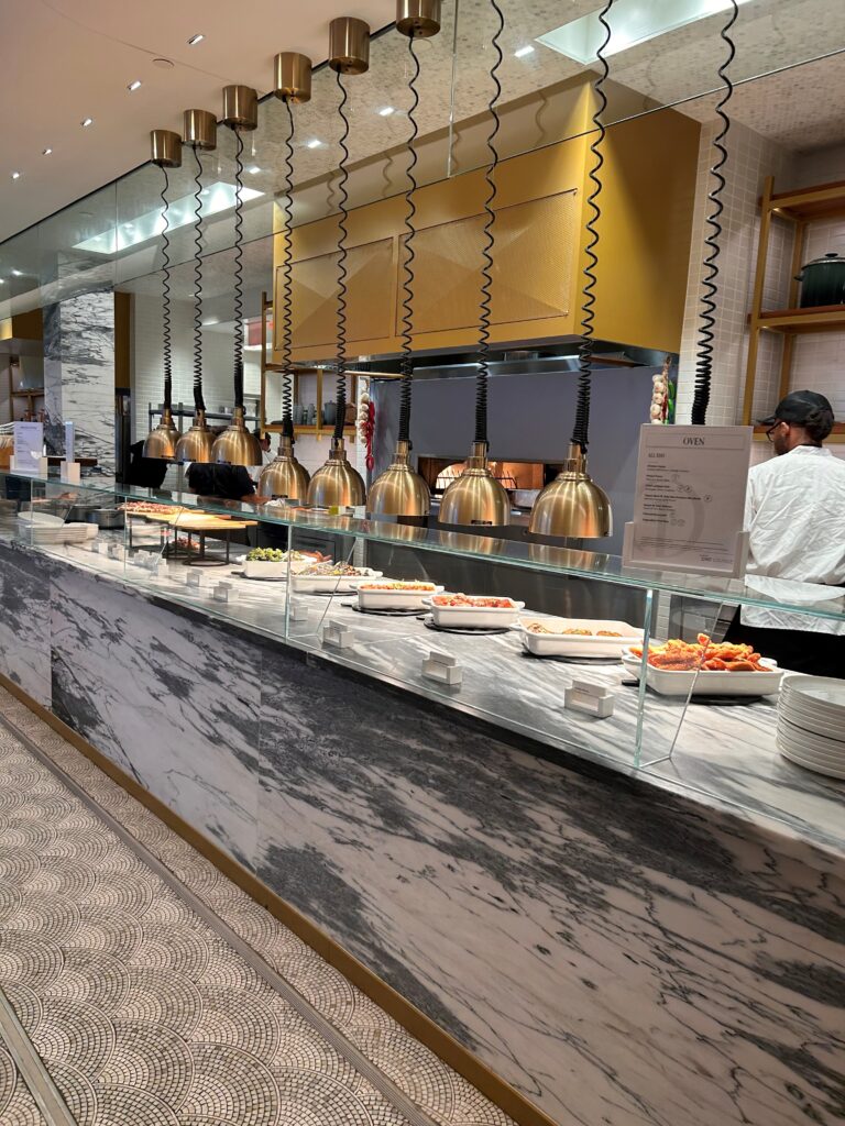 a buffet line with food on it