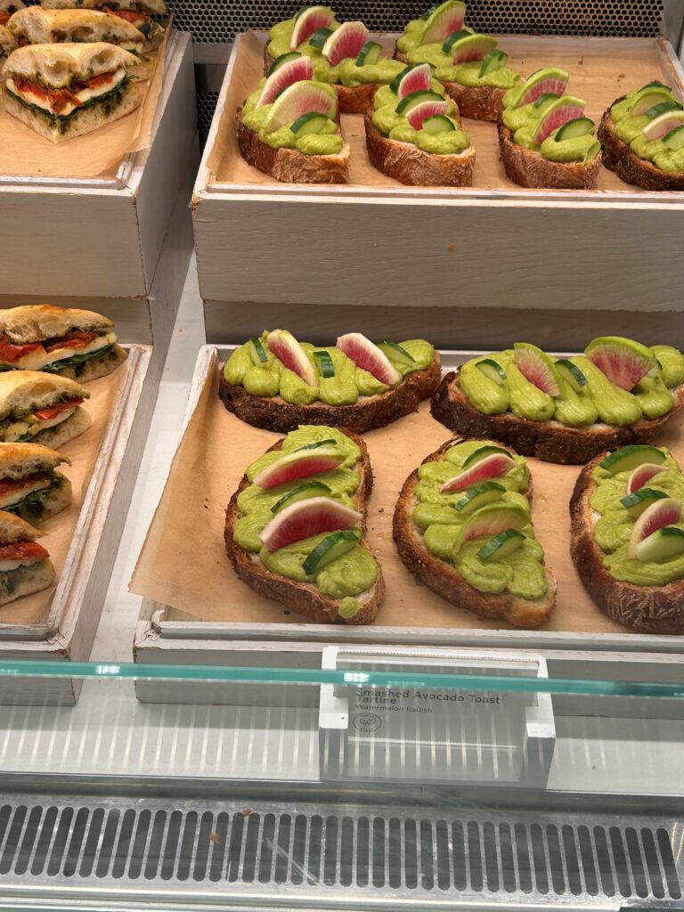 a display case with sandwiches