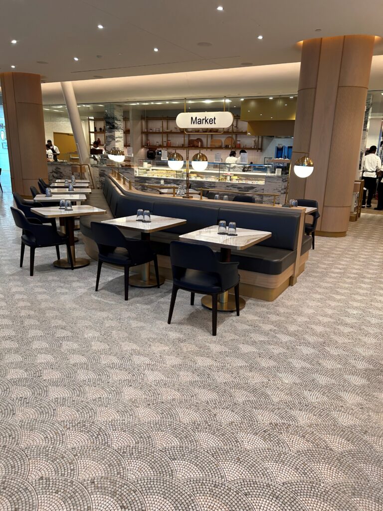 a restaurant with tables and chairs