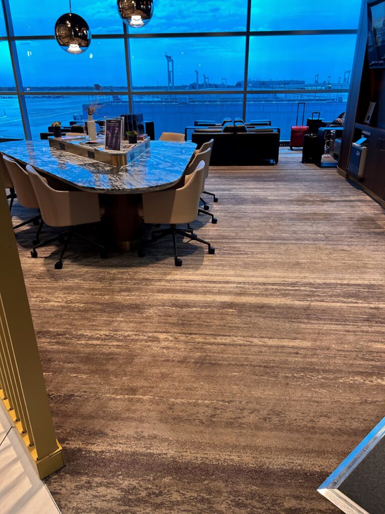 a room with a table and chairs