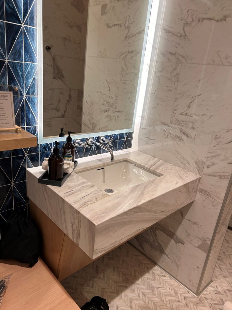 a bathroom sink with a mirror