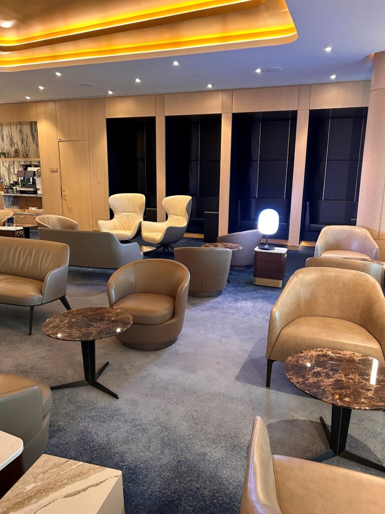 a room with chairs and tables