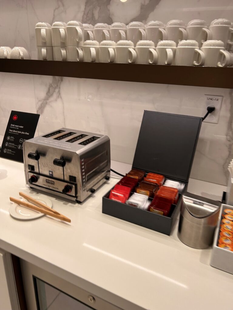 a toaster and tea bags on a counter