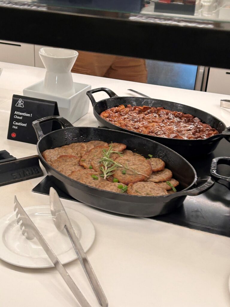 a pans of food on a table