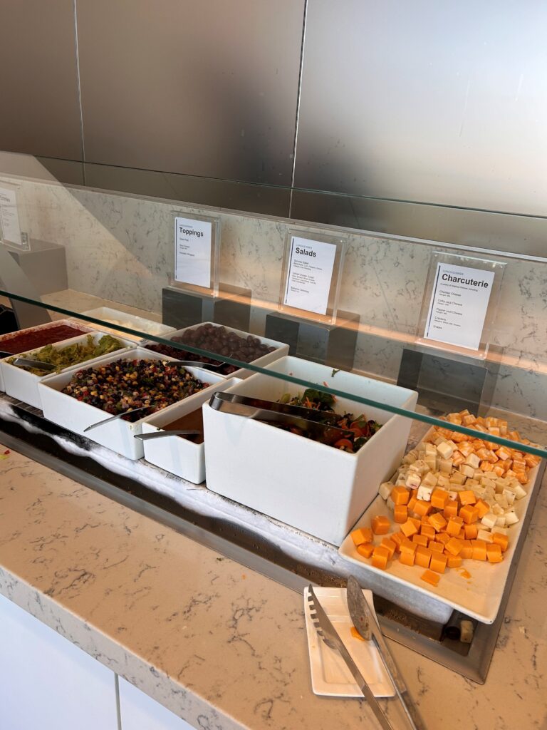 a display case with different types of food