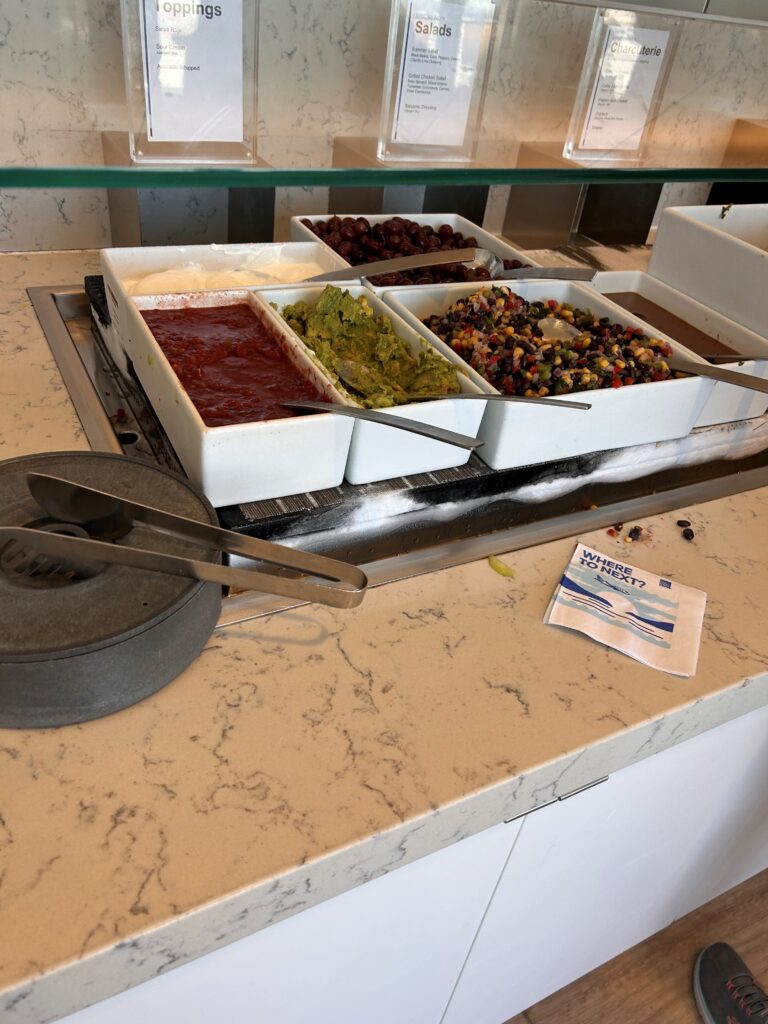 a counter with different food items in containers