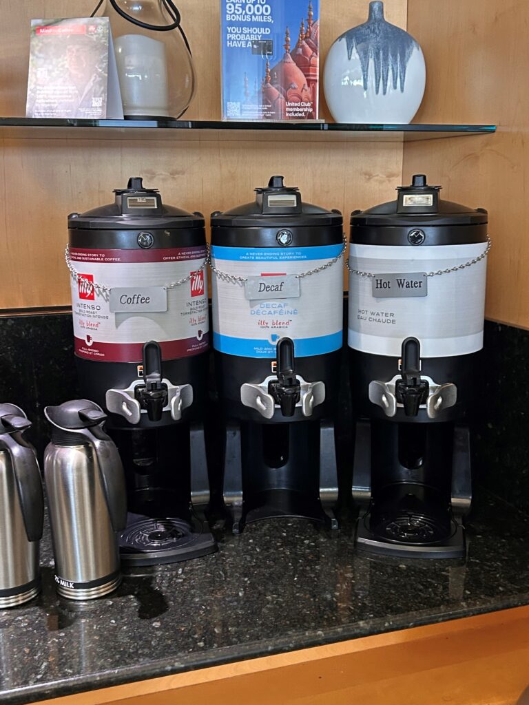 a group of coffee machines on a counter