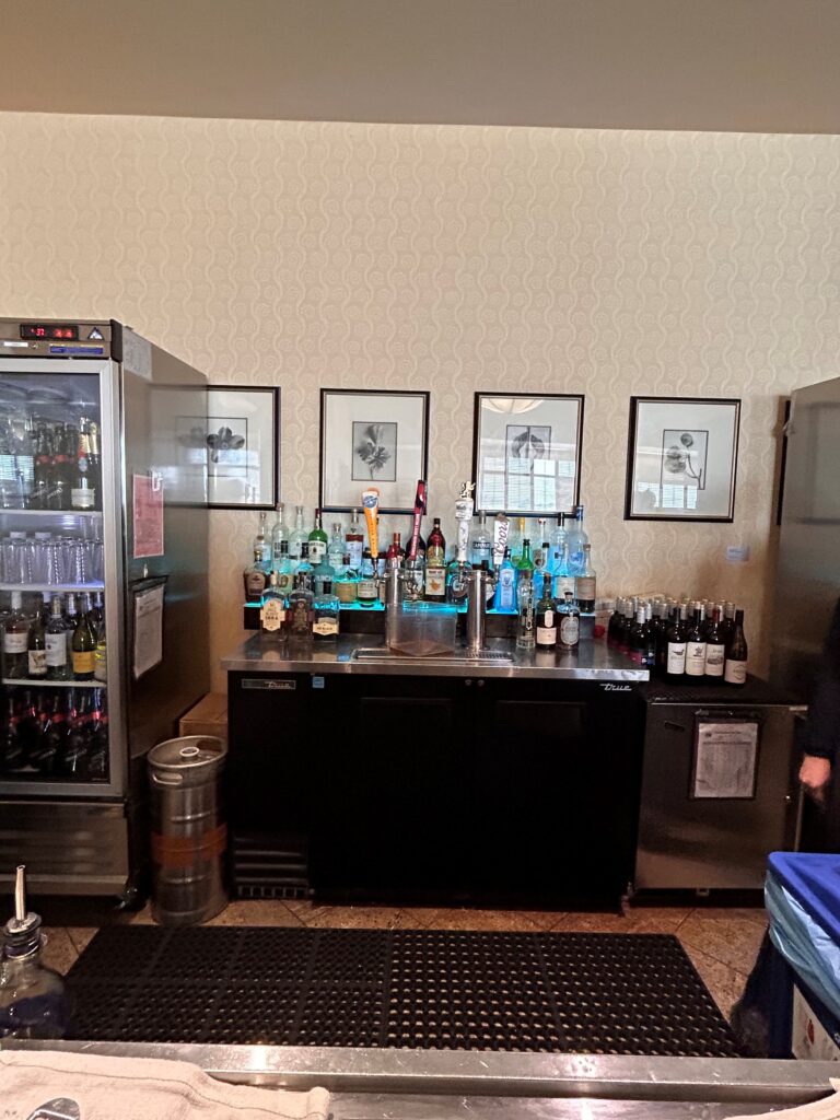 a bar with bottles of alcohol