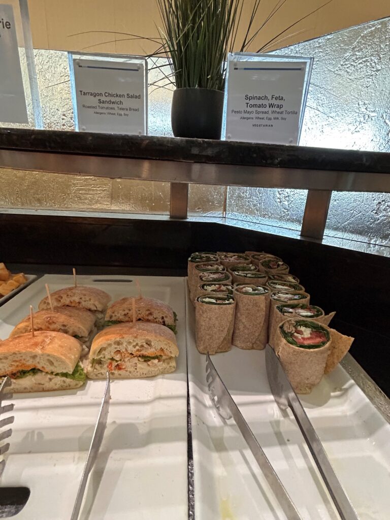 sandwiches on a tray with a variety of sandwiches