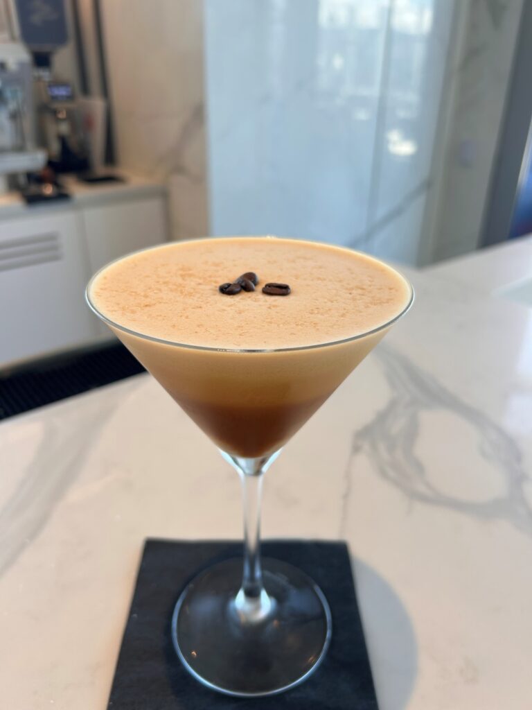 a drink in a martini glass