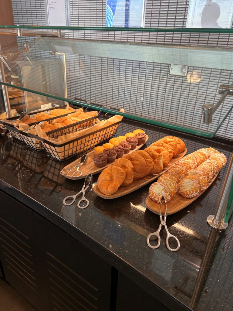 a display case with pastries and pastries