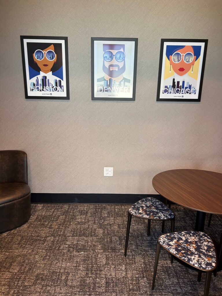 a group of posters on a wall