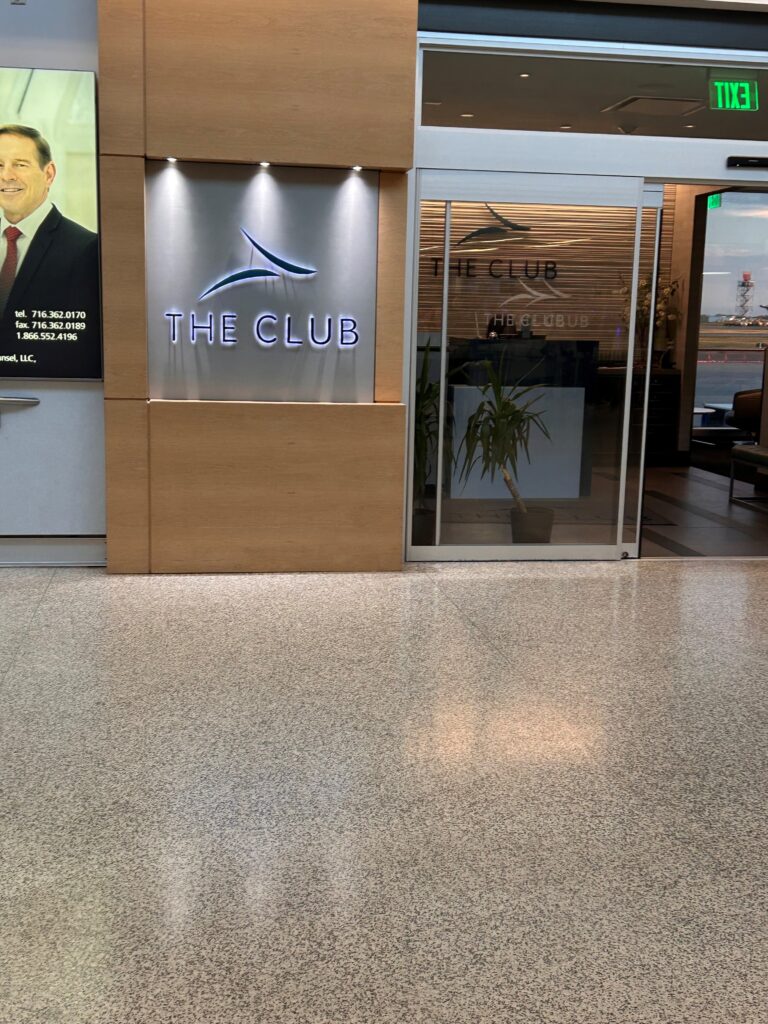 a sign in front of a building