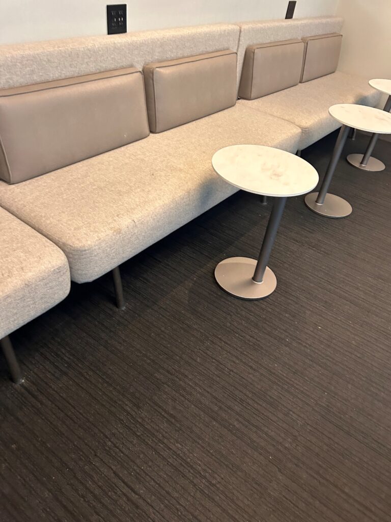 a row of chairs and tables