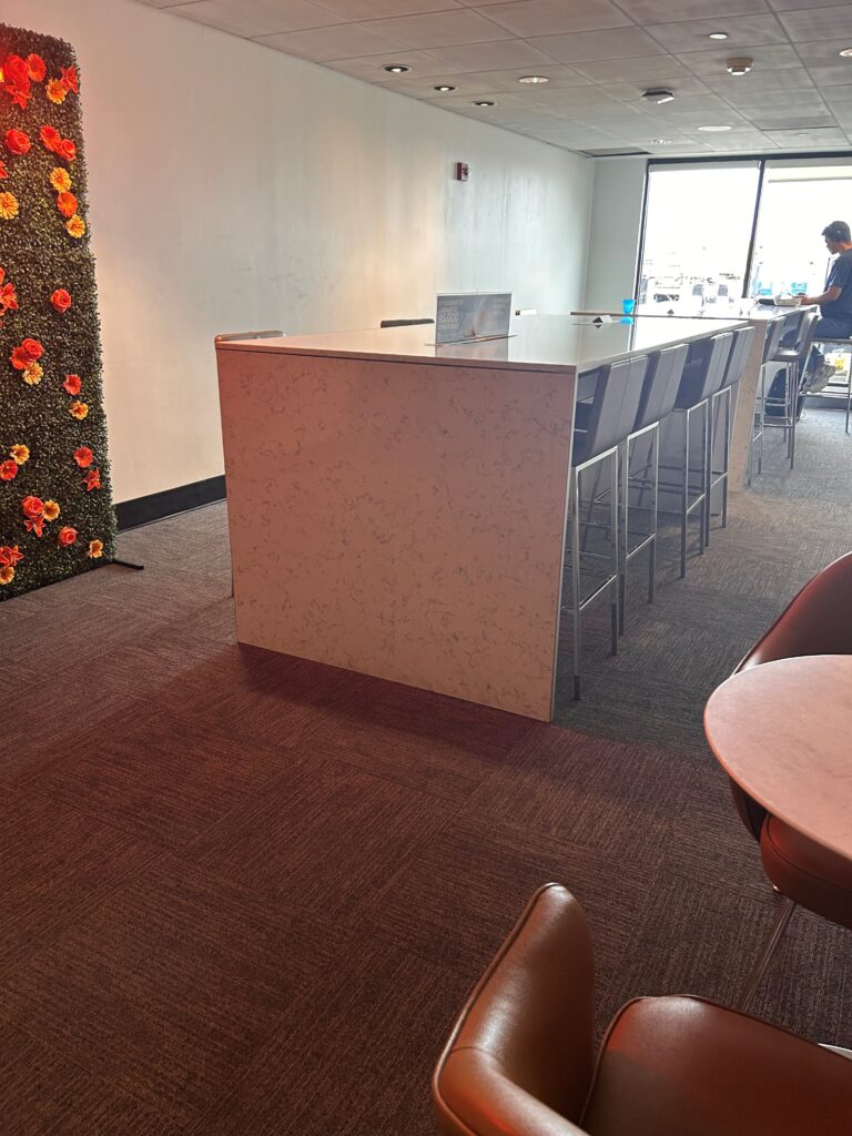 a room with a table and chairs