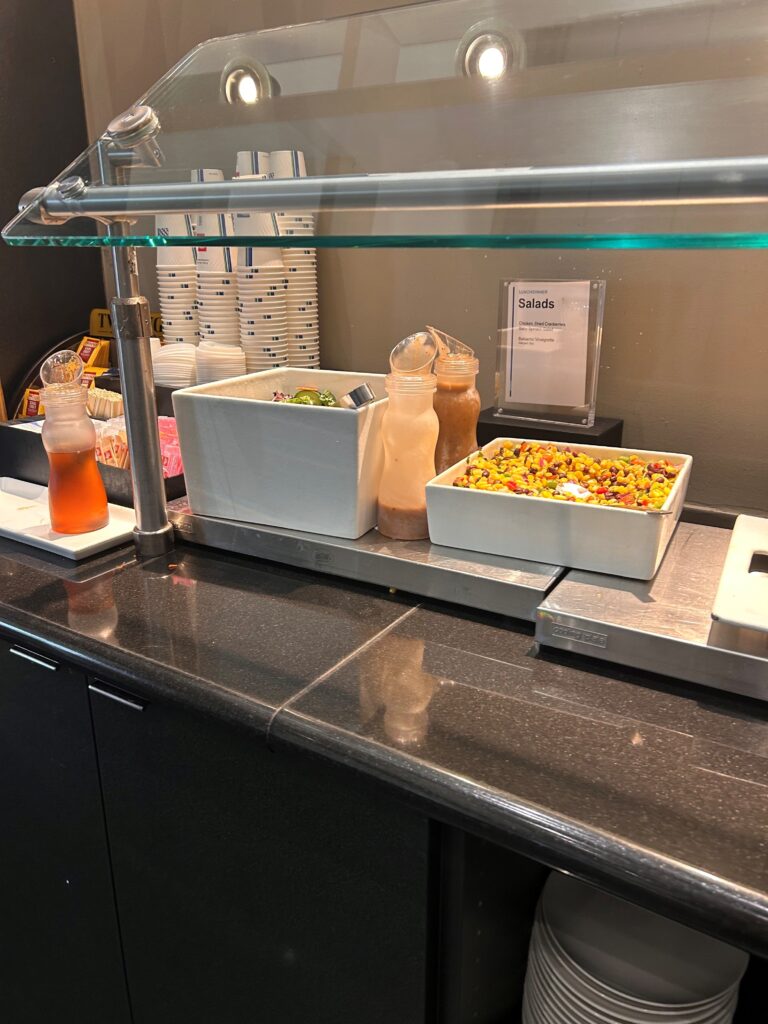 a buffet with a glass cover