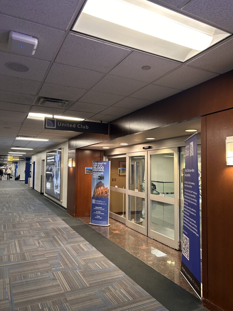a hallway with signs and doors