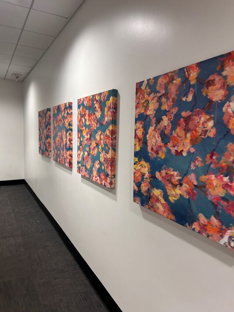 a wall with paintings on it