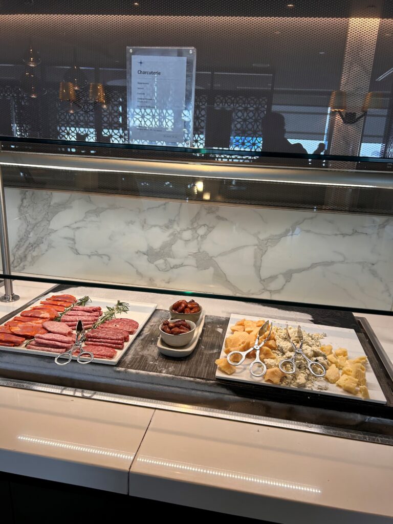 a trays of food on a counter