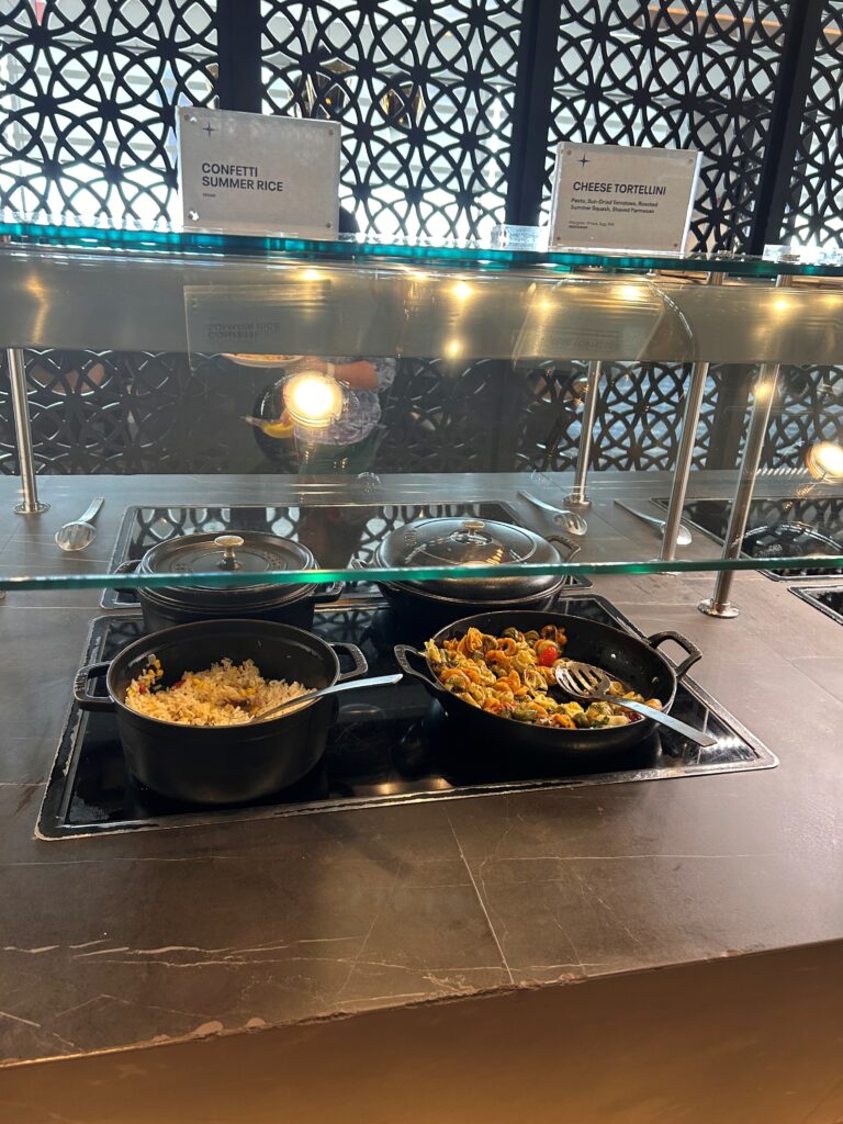food in a restaurant with a glass shelf