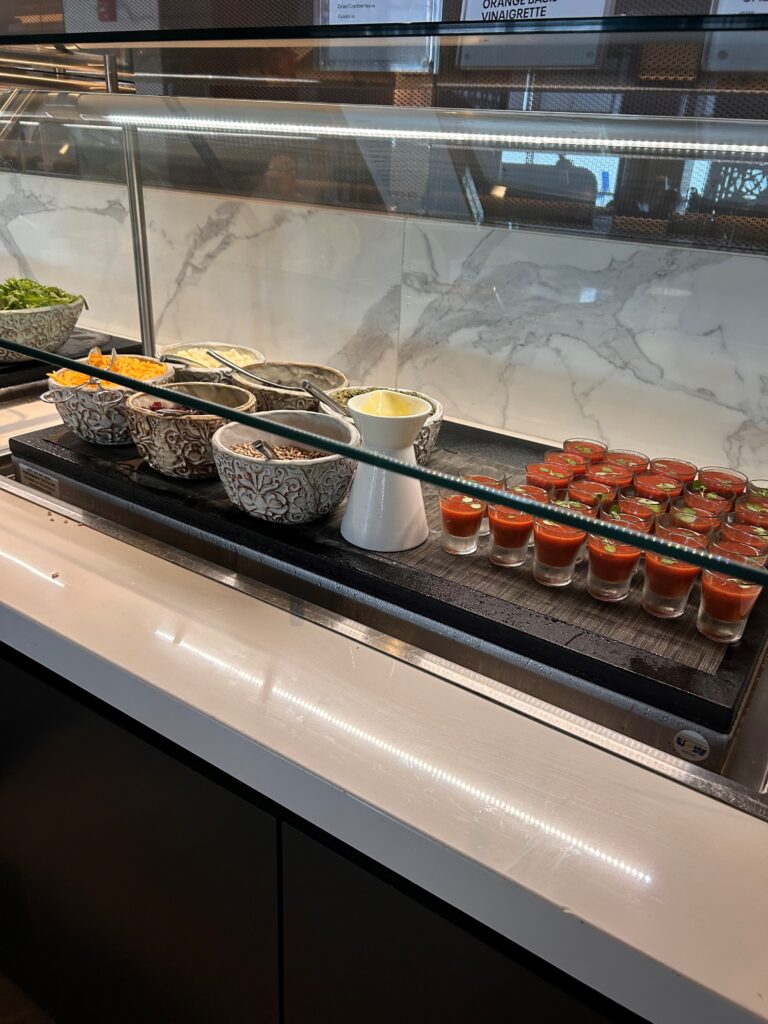 a buffet with different food items on it